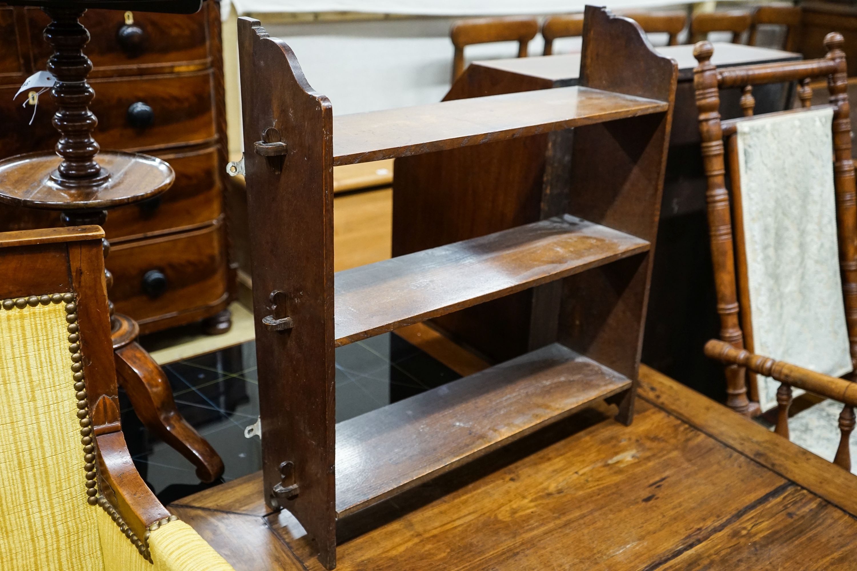 A late Victorian oak wall bracket, caned stool and chair